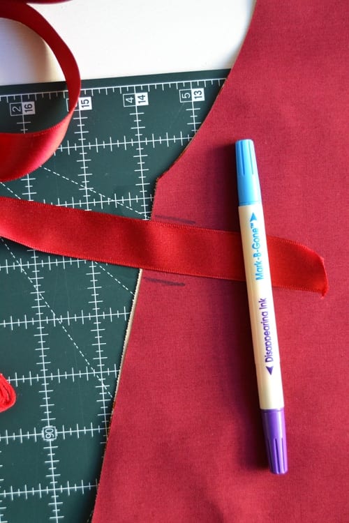 How to add ribbon ties to a homemade apron.