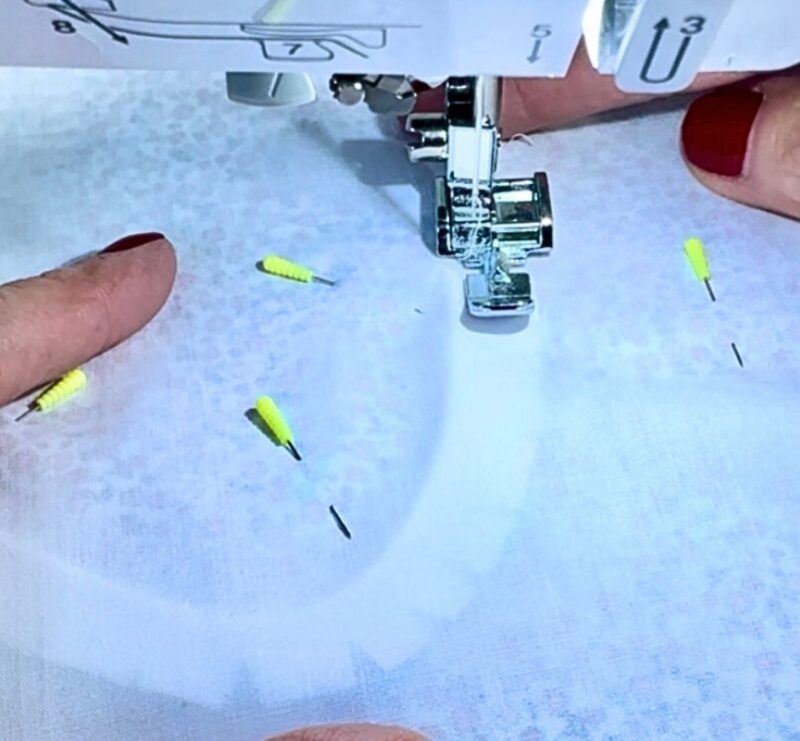 How to Sew a Child's Dress Collar with Piping 7 Stitch through the batiste lining for piping